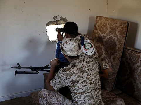 Members of Libya's government forces take their positions in Ain Zara, Tripoli, on October 14, 2019.