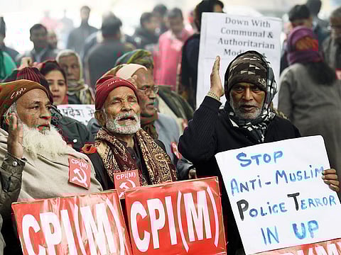 File photo: Activists from Left Parties hold placards during a cold and foggy morning as they shout anti-government slogans against CAA and NRC in Uttar Pradesh, in New Delhi on Monday.