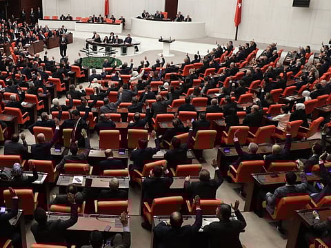 Turkish members of parliament vote to send Turkish troops to Libya, in Ankara, on January 02, 2020.