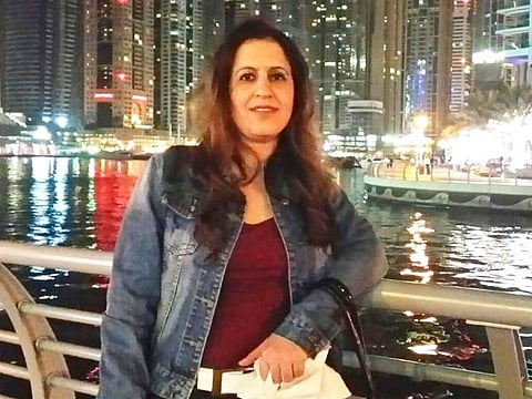 Rakhi Choudhary spends five hours a day feeding cats.