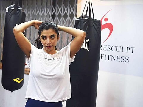 In this photo taken on December 10, 2019, aspiring actress Malhaar Rathod attends a kickboxing session at a gym in Mumbai.