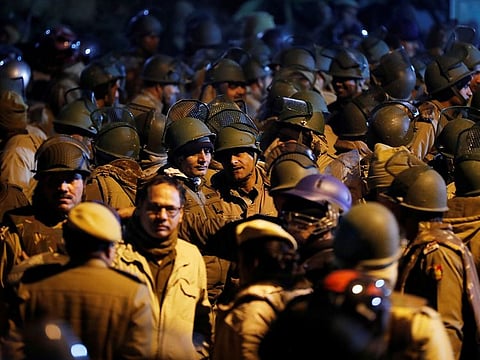 Police in riot gear stand guard inside the Jawaharlal Nehru University (JNU) after students were attacked in one of India's most prestigious universities on January 5, 2020