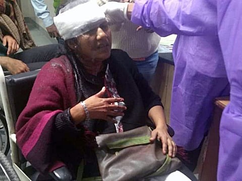 Jawaharlal Nehru University Professor Suchitra Sen attacked by goons wearing masks at the campus, in New Delhi on Sunday.