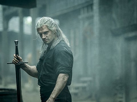 Henry Cavill plays the title character in “The Witcher.” MUST CREDIT: Katalin Vermes/Netflix