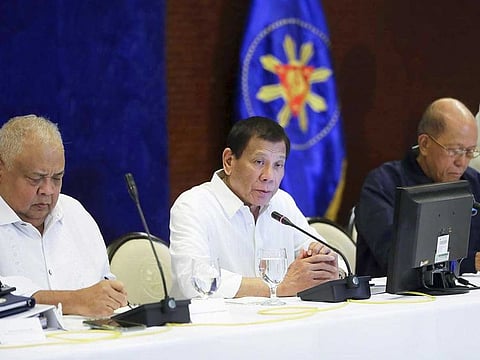 Philippine President Rodrigo Duterte, center, talks during the Joint Armed Forces of the Philippines-Philippine National Police (AFP-PNP) Command Conference at the Malacanang presidential palace in Manila, Philippines