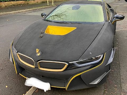 This BMW i8 has a very unusual exterior modification - a black and yellow velvet wrap and dangerously sharp carbon fibre spoilers...