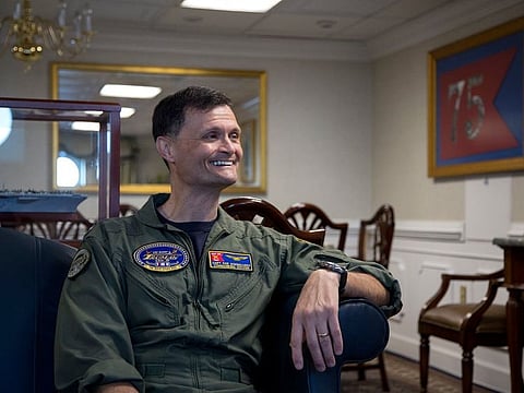 Capt. Kavon Hakimzadeh in his office aboard the USS Harry S. Truman at Norfolk Naval Station in August.