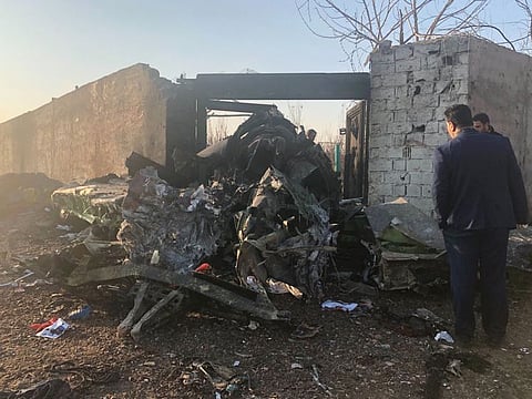 Debris is seen from a plane crash on the outskirts of Tehran, Iran, Wednesday, Jan. 8, 2019. A Ukrainian airplane carrying at least 170 people crashed on Wednesday shortly after takeoff from Tehran’s main airport, killing all onboard, state TV reported. (AP Photos/Mohammad Nasiri)