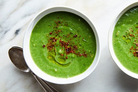 Lemony spinach soup with farro, in New York, Dec. 30, 2019. Loaded with greens and other vegetables, plus farro and creamy potato, this soup walks the line between healthful and heavy. Food Stylist: Monica Pierini. (Linda Xiao/The New York Times)
