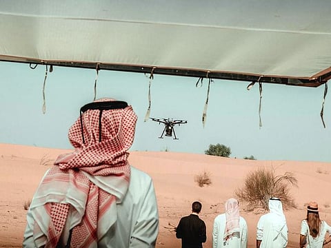 Cafu founder Rashid Al Ghurair during a recent test drop of 4,000 Ghaf tree seeds in Sharjah last month. The plan is to plant a million Ghaf tree seeds by drone within two years.