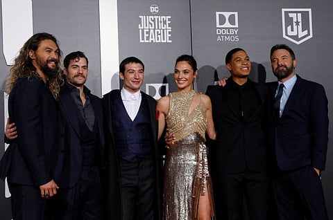 FILE PHOTO: World Premiere of Warner Bros. Pictures’ Justice League – Arrivals – Los Angeles, California, U.S., 13/11/2017 - (L-R) Jason Momoa, Henry Cavill, Ezra Miller, Gal Gadot, Ray Fisher and Ben Affleck pose. REUTERS/Mario Anzuoni/File Photo