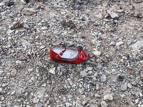 A child's shoe is pictured on January 8, 2020 at the scene of a Ukrainian airliner that crashed shortly after take-off near Imam Khomeini airport in the Iranian capital Tehran.