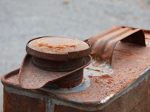 A rusty can of gasoline. For illustrative purposes only.