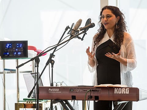 Swapna Abraham, Golden Book Of Records Award for composing 1000 song in 1000 days receiving her certificate at the Burj Al Arab. Dubai.