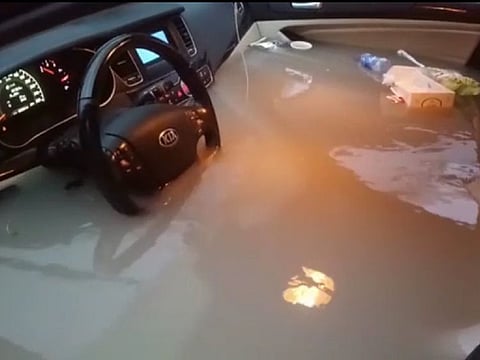 A flooded car in the UAE. For illustrative purposes only.