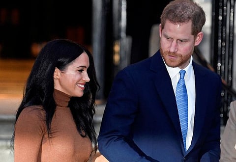 Britain's Prince Harry and his wife Meghan, Duchess of Sussex, leave Canada House in London on January 7, 2020.