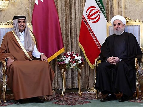 Shaikh Tamim (left) with Iranian President Hassan Rouhani.