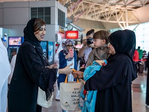 Free books being handed out to passengers at Sharjah Airport