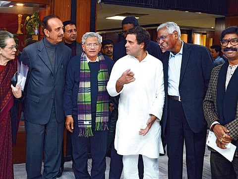Congress Interim President Sonia Gandhi, Congress leaders Ghulam Nabi Azad, Rahul Gandhi, Jharkhand Chief Minister Hemant Soren and others come out after the opposition party meeting, in New Delhi on Monday.