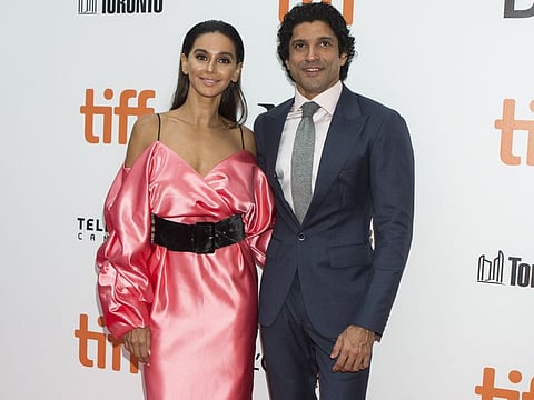 (190913) -- TORONTO, Sept. 13, 2019 (Xinhua) -- Actress Shibani Dandekar and actor Farhan Akhtar pose for photos before the world premiere of the film "The Sky Is Pink" at Roy Thomson Hall during the 2019 Toronto International Film Festival (TIFF) in Toronto, Canada, on Sept. 13, 2019. (Photo by Zou Zheng/Xinhua)