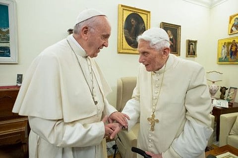 Pope Francis (L) meeting with Pope Benedict XVI (R) at the Vatican on December 21, 2018. Former pope Benedict XVI has publicly urged his successor Pope Francis not to open the Catholic priesthood up to married men, in a plea that stunned Vatican experts on January 12, 2020.