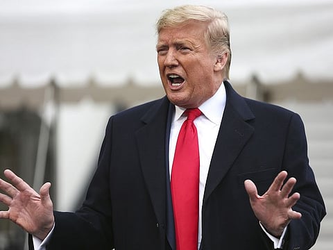 U.S. President Donald Trump speaks to members of the media before boarding Marine One on the South Lawn of the White House in Washington, D.C., U.S., on Monday, Jan. 13, 2020.