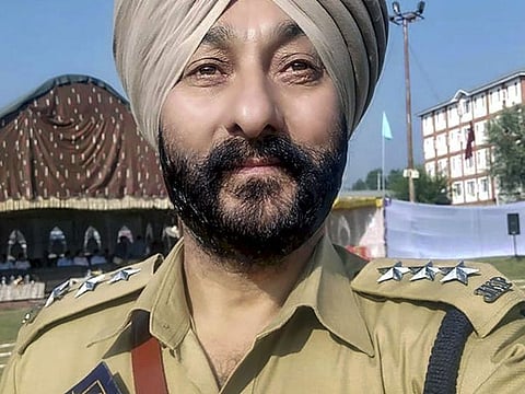 Deputy Superintendent of Police Davinder Singh was arrested along with two militants whom he was ferrying in a car in Kashmir Valley on Sunday.
