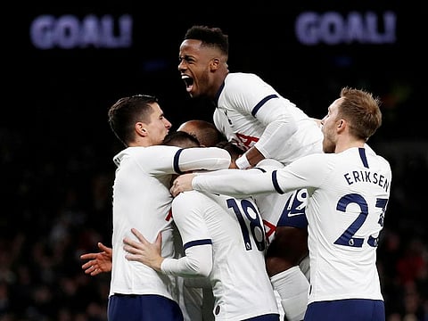 Tottenham Hotspur's Giovani Lo Celso celebrates scoring their first goal with teammates.