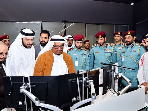 Lieutenant General Dhahi Khalfan inspects police operations room equipment