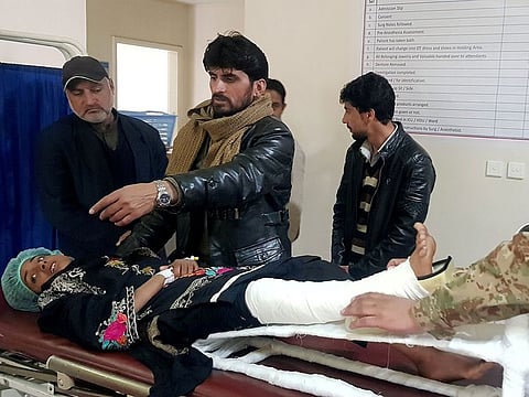 Samina, 12, who was rescued after heavy snowfall and avalanches in Bakwali village in Neelum Valley near line of control (LoC), receives first aid at a hospital in Muzaffarabad, Pakistan January 15, 2020.