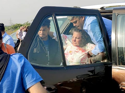 Maharashtra, Jan 18 (ANI): Bollywood actress Shabana Azmi being taken out from car after an accident on Mumbai-Pune Expressway on Saturday. (ANI Photo)