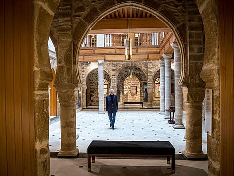 Andre Azoulay, adviser to the Moroccan king, poses for a picture at the "Bayt Dakira" (House of Memory) Jewish museum, in Morocco's Atlantic coastal city of Essaouira on December 14, 2019.