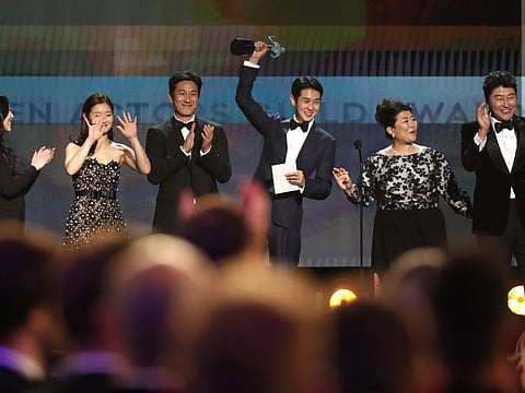 26th Screen Actors Guild Awards - Show - Los Angeles, California, U.S., January 19, 2020 - The cast of "Parasite" accepts the award for Outstanding Performance by a Cast in a Motion Picture.