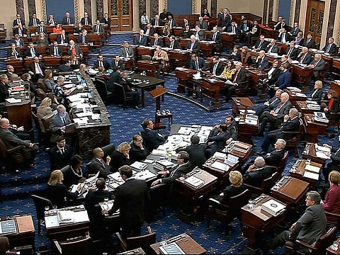 Senators vote on approving the rules for the impeachment trial against President Donald Trump in the Senate at the US Capitol in Washington on Wednesday.