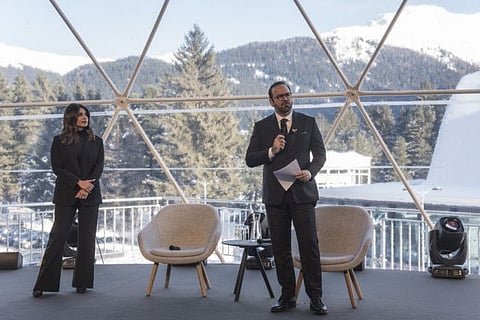 Mohammed Abdullah Al Gergawi, Minister of Cabinet Affairs and Future speaks in Davos as Priyanka Chopra looks on