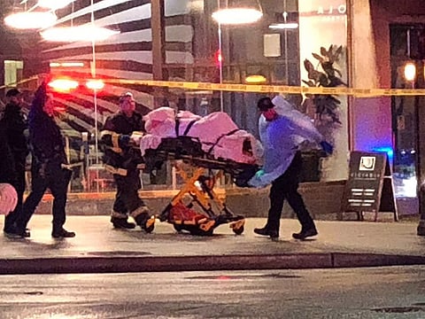 Paramedics and police rush to aid to a shooting victim in downtown on January 22, 2020 in Seattle, Washington.