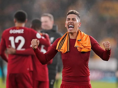 Liverpool's Roberto Firmino celebrates after the match.