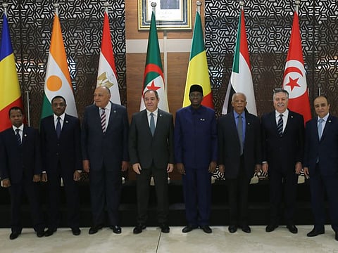 Foreign Ministers and officials from countries neighbouring Libya pose for a family photo during a meeting to discuss the conflict in Libya, in Algiers Algeria January 23, 2020.