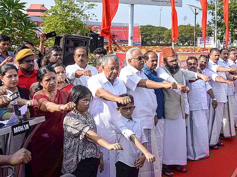 Kerala Chief Minister Pinarayi Vijayan forms a human chain as he participates in an anti-CAA protest in Thiruvananthapuram on Sunday.