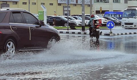 Motorists have been urged to drive carefully as heavy winds and rains reduce visibility in Dubai