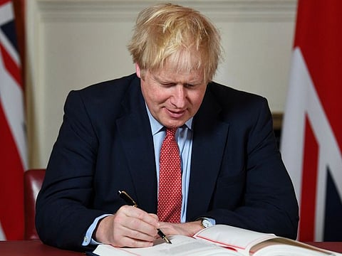 British Prime Minister Boris Johnson signing the Brexit agreement on January 24.