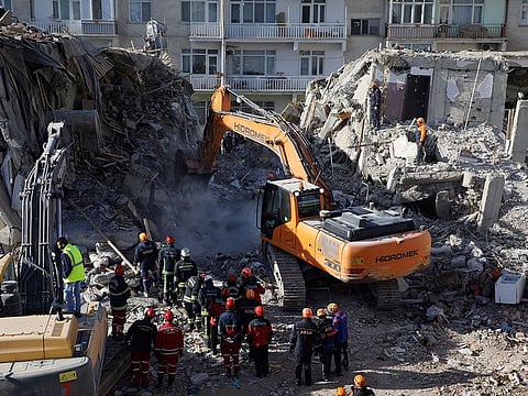 Search and rescue personnel work at the site of a collapsed building, after an earthquake in Elazig, Turkey, January 27, 2020.