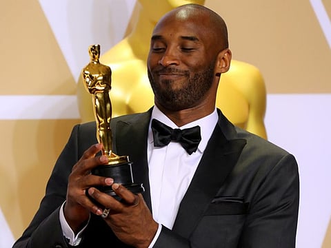 Kobe Bryant with Best Animated Short Film Award for "Dear Basketball".