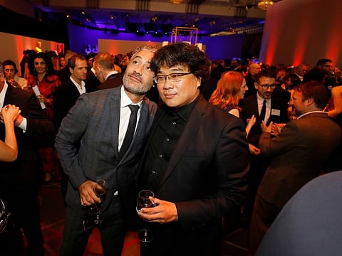 Taika Waititi, Best Picture Writing, left, with Parasite Director Bong Joon-ho as 92nd Academy Awards Nominees gather for the luncheon at the Hollywood and Highland complex Monday, Jan. 27, 2020 in Los Angeles.