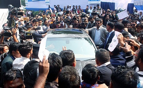 West Bengal Governor Jagdeep Dhankhar leaves as he is prevented by a section of students from attending the Calcutta University's annual convocation at Nazrul Mancha in Kolkata on Tuesday.