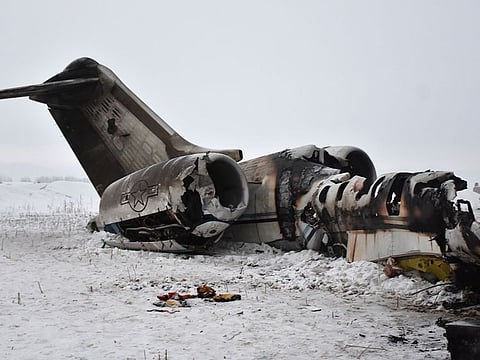 The wreckage of a US Bombardier E-11A jet is seen after it crashed in mountainous territory of Deh Yak district in Ghazni Province.