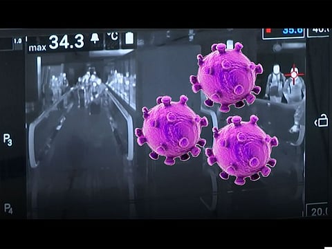 File picture of airport scanners monitoring passengers for coronavirus. A senior official added all coronavirus-positive cases are in stable health condition, stressing that news reports about a female household worker who recently died in Dubai was baseless.