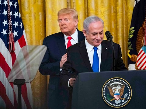 Donald Trump and Israel's Prime Minister Benjamin Netanyahu while unveiling the Middle East peace plan in the East Room of the White House, January 28, 2020