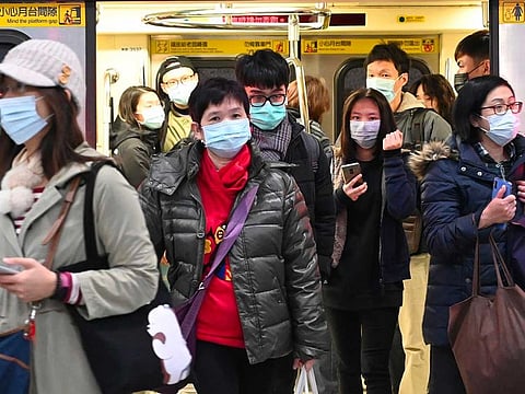 Scientists discovered the genetic mutation of the SARS-CoV-2 as early as February and it has circulated in Europe and the Americas, the World Health Organization said. The WHO has also said there is no evidence the mutation has led to more severe disease. Photo shows mask-clad commuters get off a train at a Mass Rapid Transit (MRT) stop in Taipei following the Lunar New Year holidays on January 30, 2020