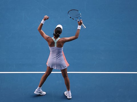 Spain's Garbine Muguruza celebrates after beating Romania's Simona Halep.